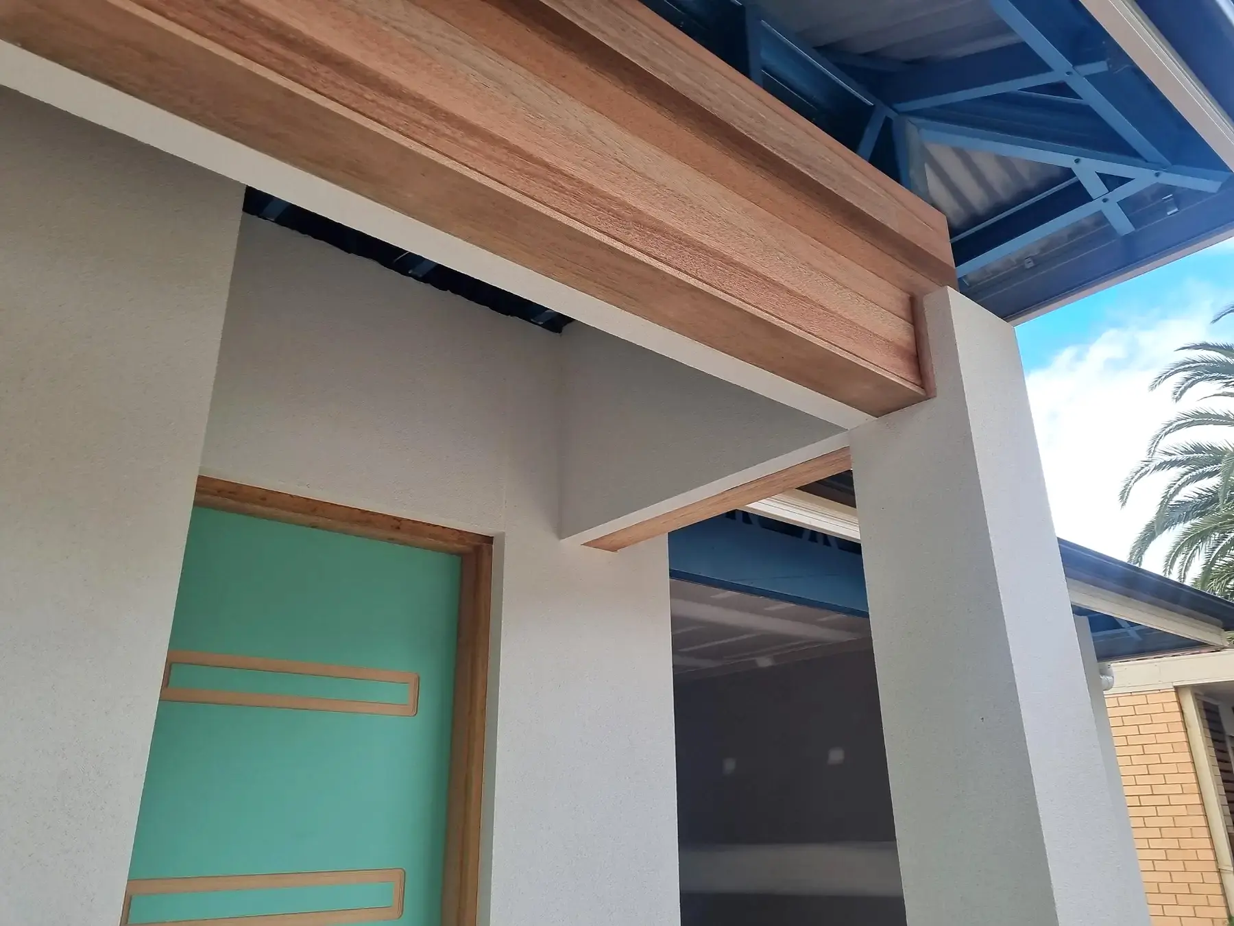 Close detail of the timber portal beam and soffit