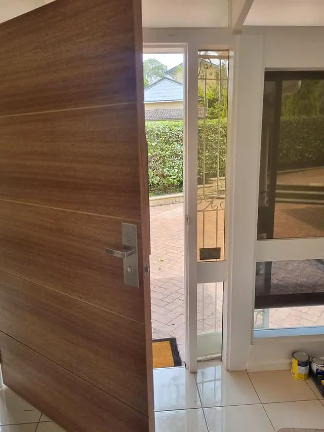 The new timber entry door seen from inside