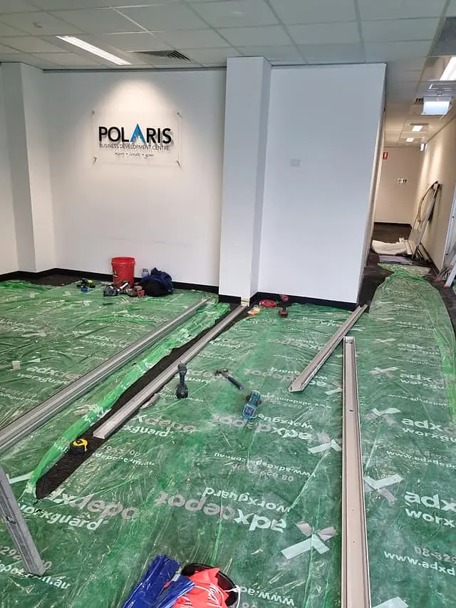 Materials set out on the office floor at the start of the fit-out