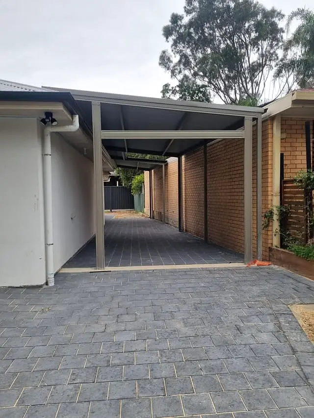 Framing the new garage walls during the carport conversion